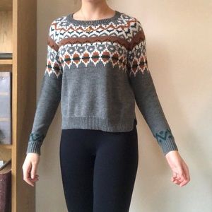 Woman’s multicolored sweater